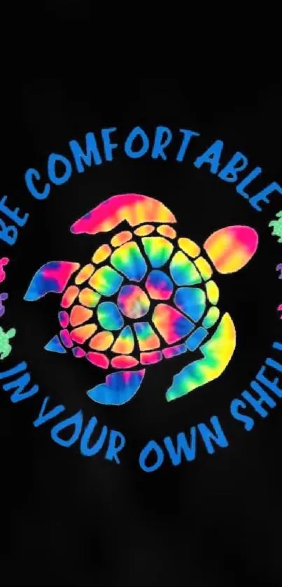 Vibrant rainbow turtle shell with motivational text on black background.