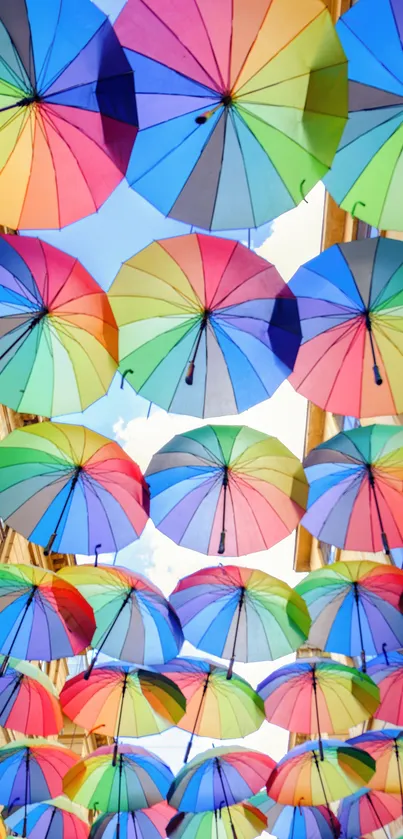 Vibrant street scene with colorful umbrellas overhead.