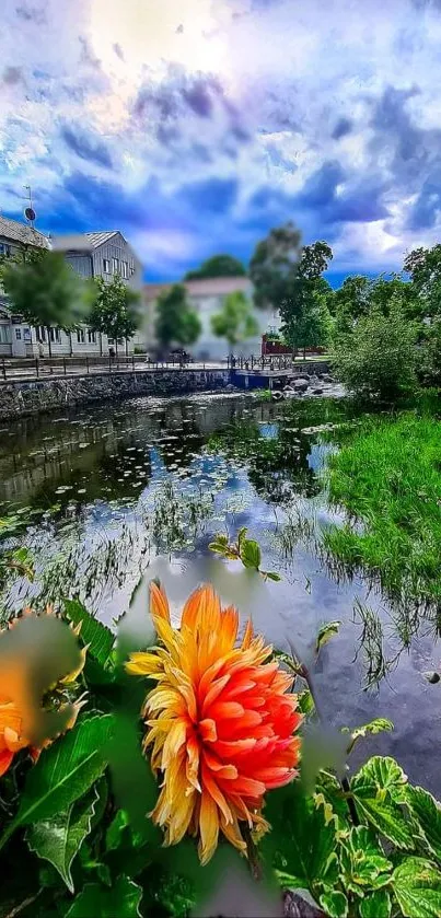 Colorful flower by a city river with cloudy sky.