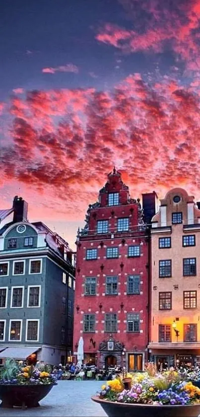 Vibrant Stockholm cityscape at sunset with colorful sky and historic buildings.