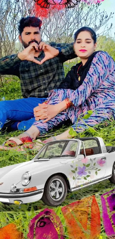 Couple in field with vintage floral car