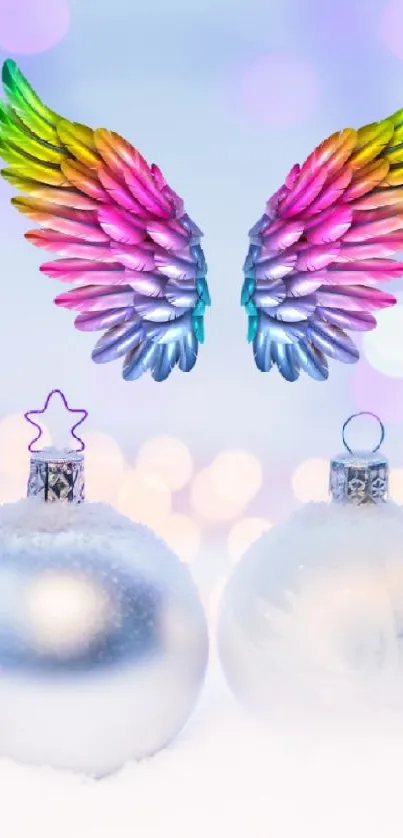 Colorful wings and ornaments on snowy background for festive decor.