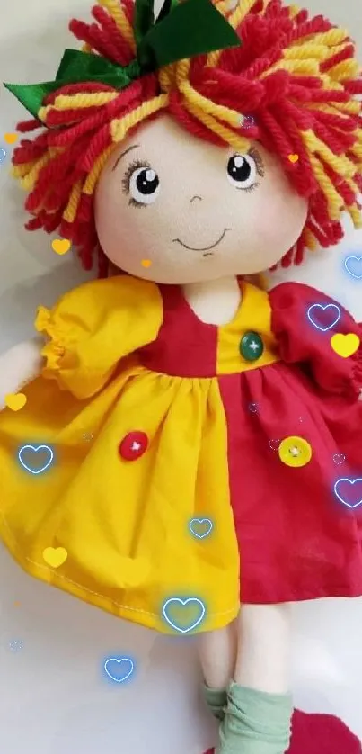 Colorful wool doll in bright attire with vibrant red hair.