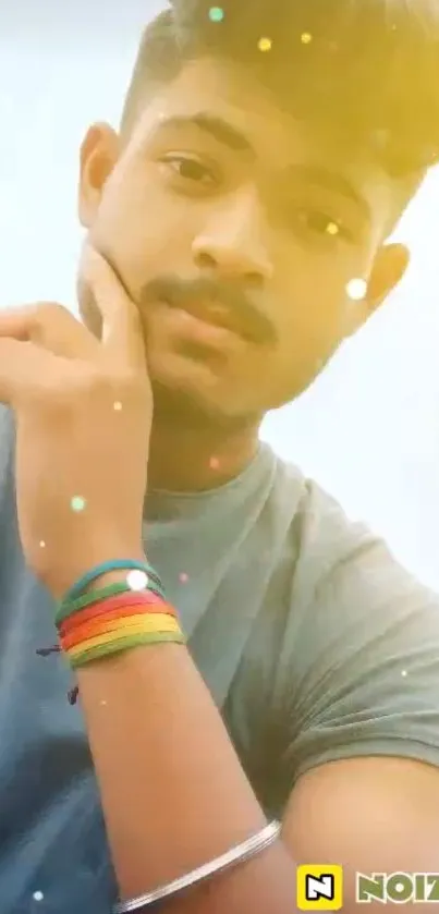 Mobile wallpaper of a stylish young man with colorful wristbands.