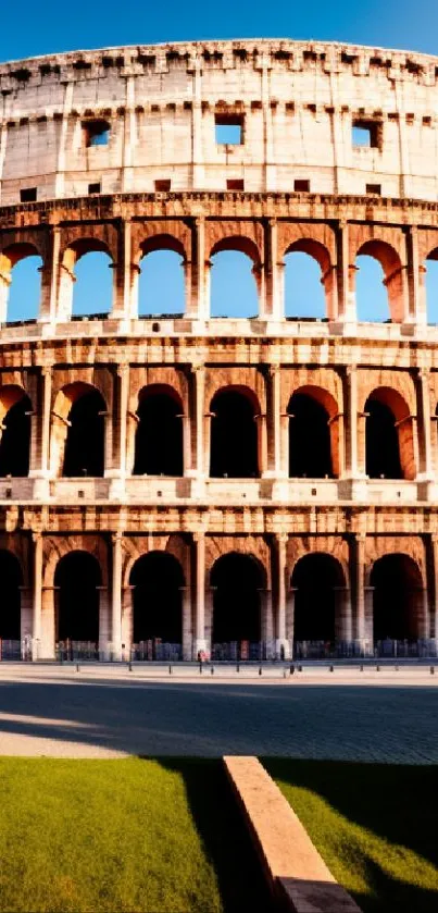 Stunning sunrise view of the Colosseum in Rome, showcasing its ancient architecture.