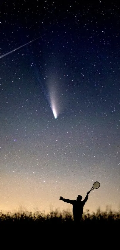 Silhouette under comet in a starry night sky.