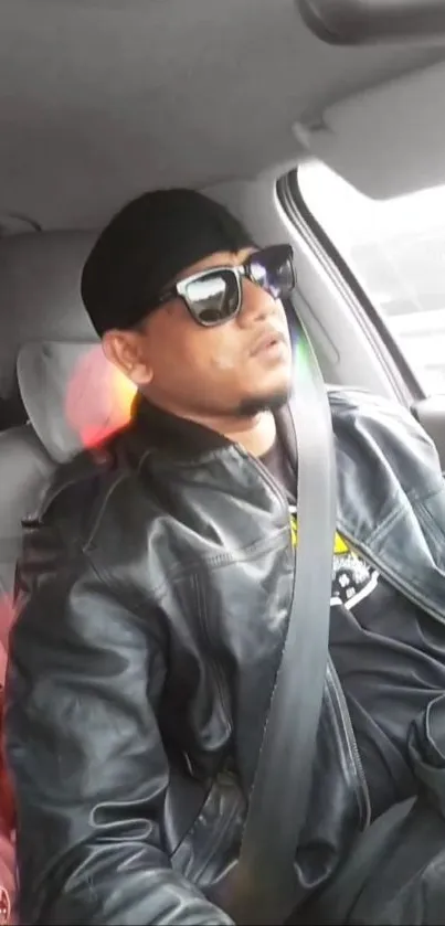 Cool car ride with sunglasses and leather jacket.