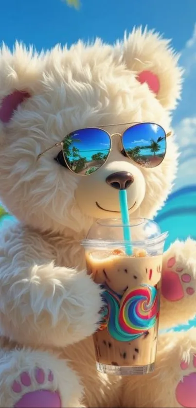 Teddy bear with sunglasses enjoying iced coffee by the beach.