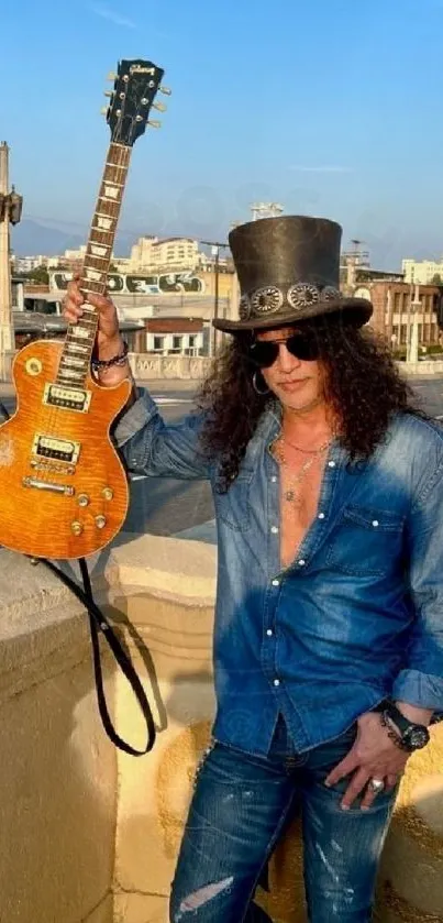 Guitarist in denim on urban bridge with electric guitar.