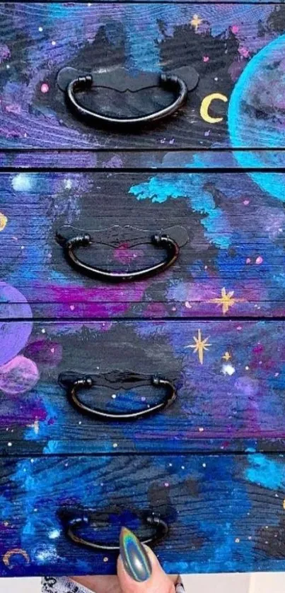 Hand-painted galaxy-themed drawers in vibrant colors.