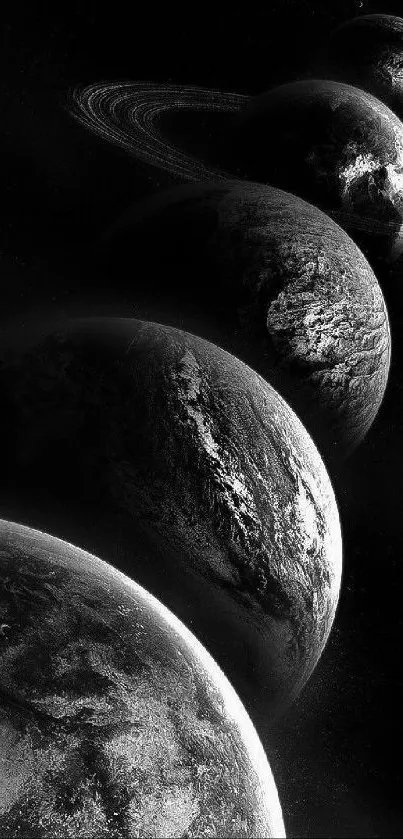 Monochrome wallpaper of planets aligned in space.