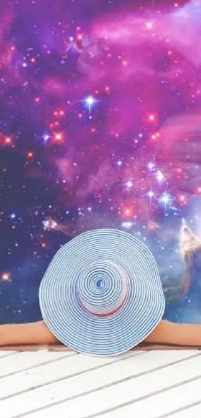 Person in sunhat relaxing under a cosmic galaxy view.