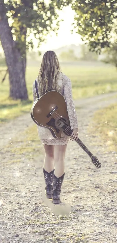 Person with guitar on sunlit path in nature.