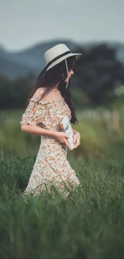 Woman in a floral dress walking through green fields.