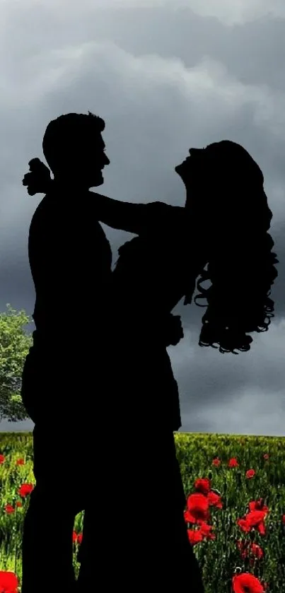 Silhouette of a couple in a vibrant flower field under a gray sky.