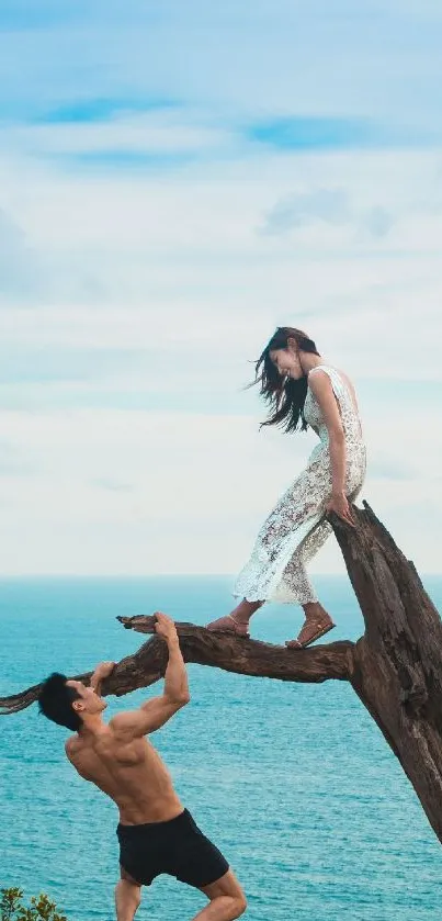 Couple on tree over ocean in scenic wallpaper.