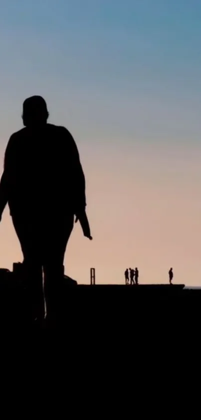 Silhouette of a couple at sunset, hand in hand, against a calm sky backdrop.