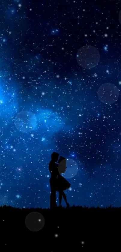 Couple silhouette under a vibrant, starry sky with dark blue tones.