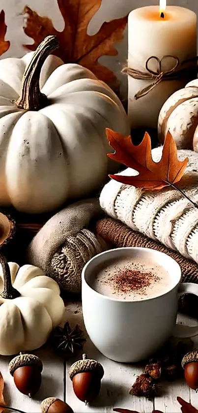 Cozy autumn still life with pumpkins and candle.