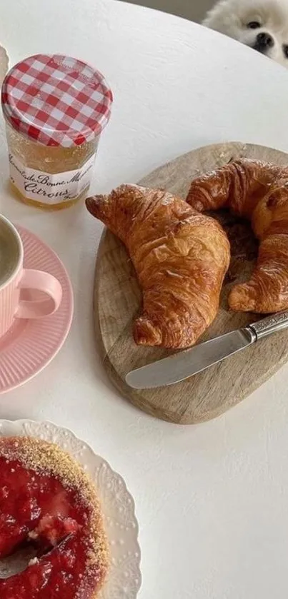 Breakfast table with croissants and coffee.