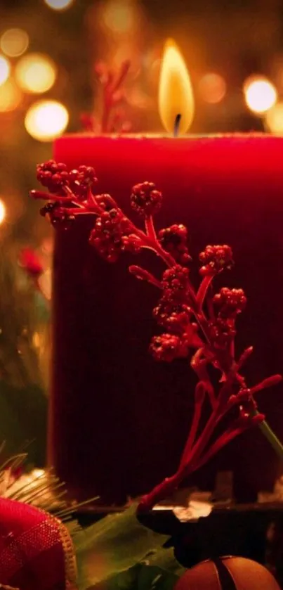 Cozy holiday candle with red berries glowing warmly.