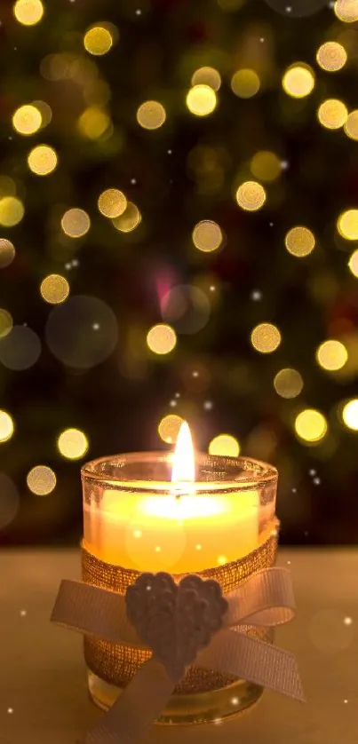 Candle glowing in front of blurred Christmas tree with lights.