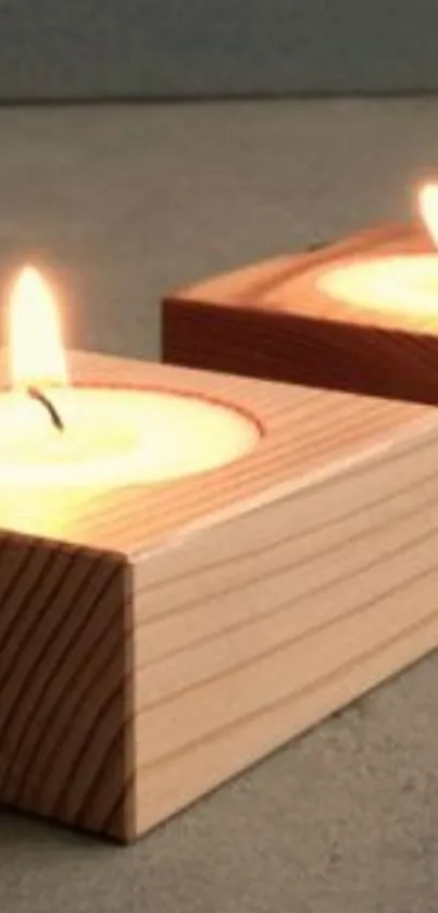 A cozy candlelight scene with wooden block candleholders.