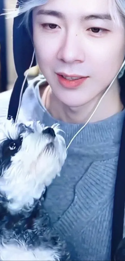 Person wearing a hoodie holding a dog, creating a cozy vibe.