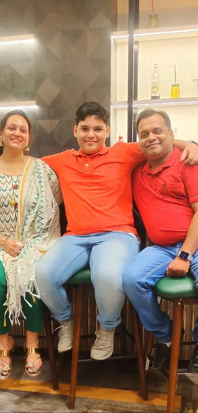 Family enjoying a cozy bar lounge environment, seated at a counter.