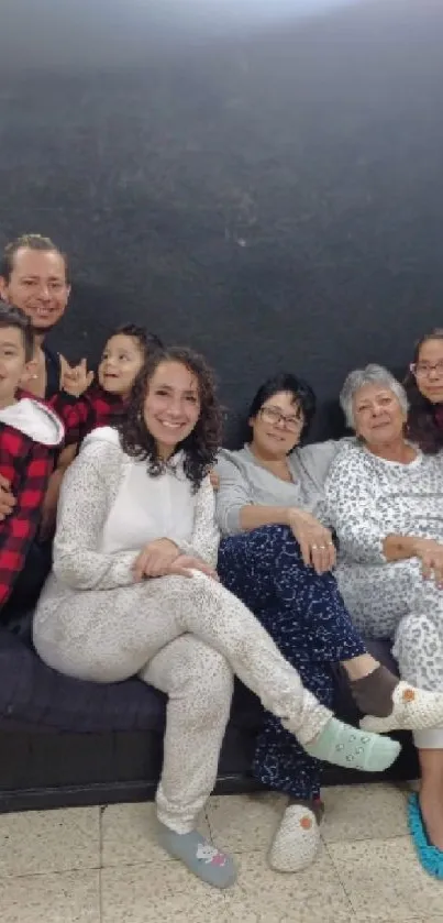 Family gathered on sofa in a cozy room.