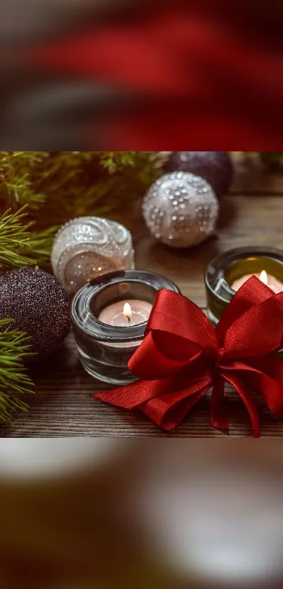 Cozy holiday candles with red ribbon and ornaments.