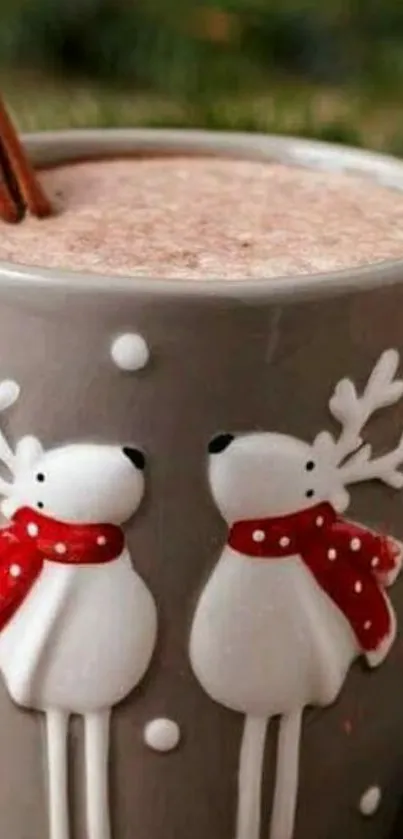 Gray mug with reindeer design and cocoa.