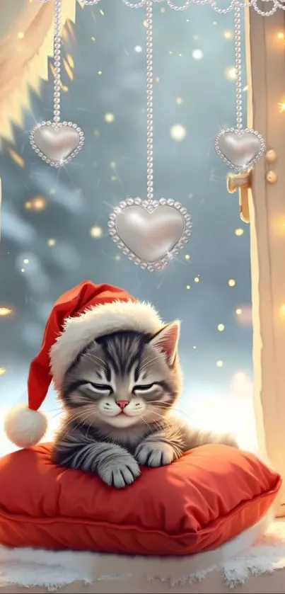 Kitten in Santa hat on pillow by snowy window with heart decorations.