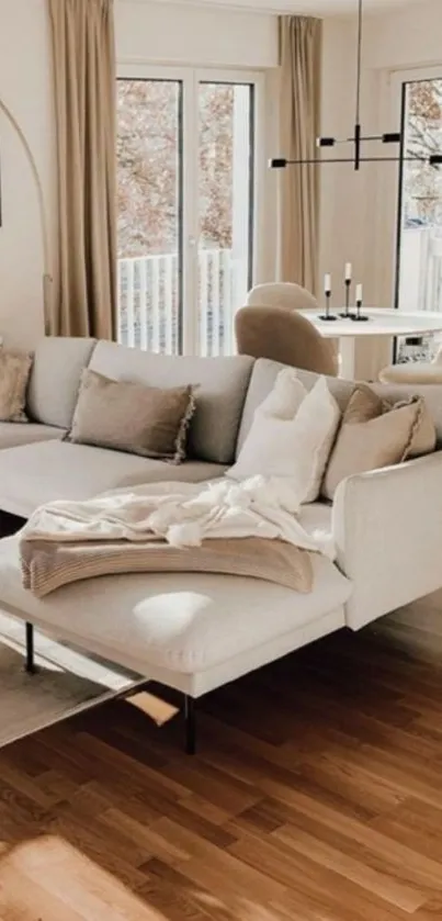 Minimalist beige living room with cozy furniture and natural light.