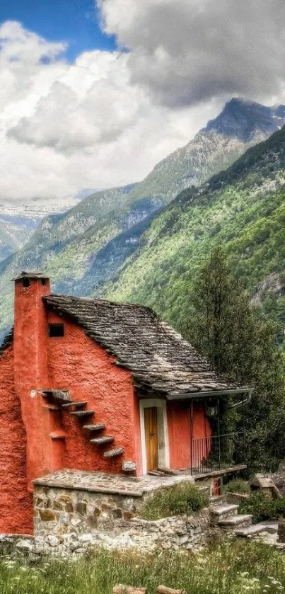 Cozy red cabin amidst lush mountains and sky