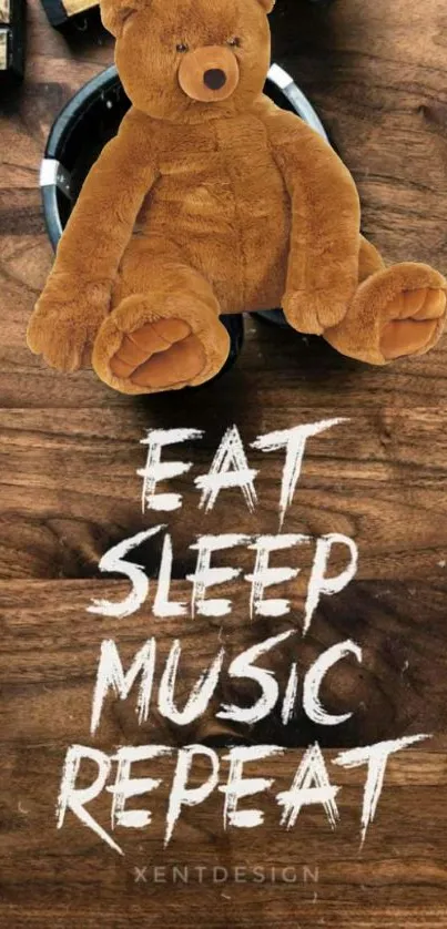 Mobile wallpaper with teddy bear and text 'Eat Sleep Music Repeat'.