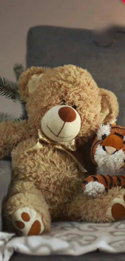 Cuddly teddy bear with a tiger plush on a cozy chair in soft lighting.