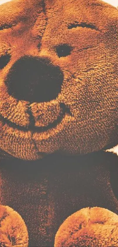 Cozy teddy bear on a backdrop of love decor.
