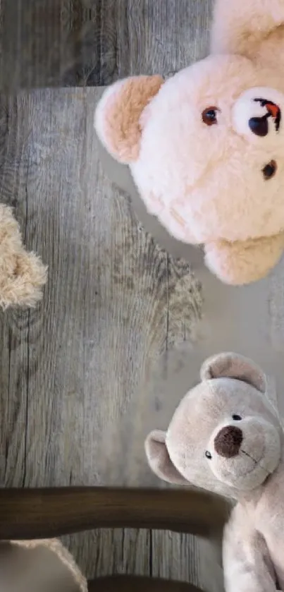 Mobile wallpaper with cute teddy bears on wooden background.