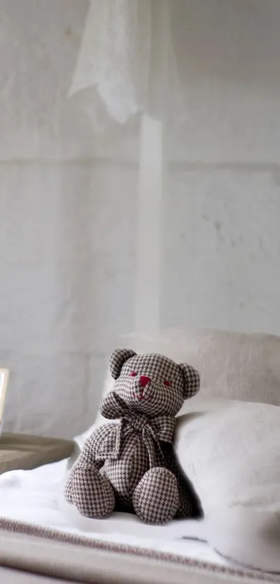 Gingham teddy bear sits on a cozy bed with soft pillows.