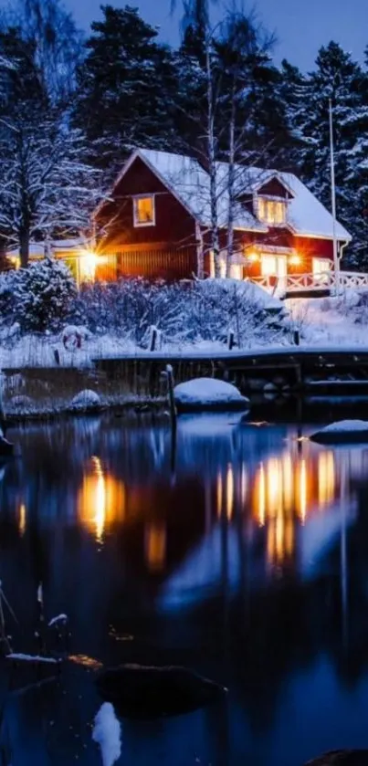 Cozy winter cabin by a snowy lake at night.