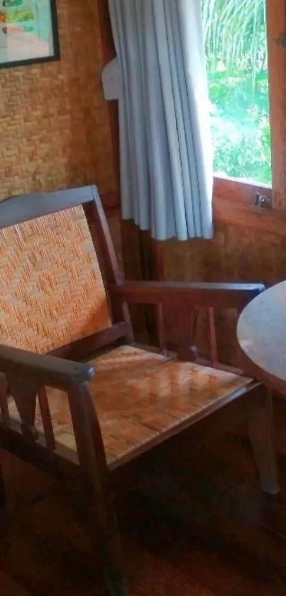 Cozy corner with wooden chair and table near window.