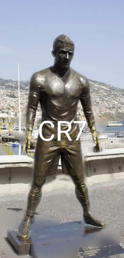 CR7 bronze statue with coastal view in background.