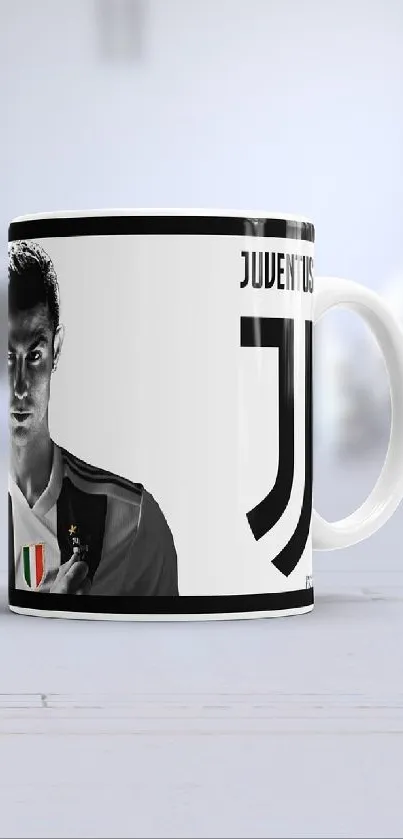 White and black CR7 Juventus mugs on display.