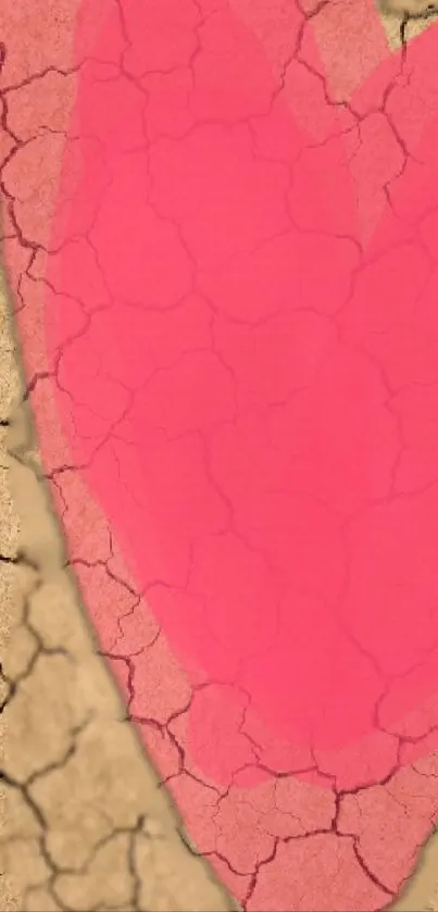 Heart on cracked earth wallpaper with a dominant pink color.