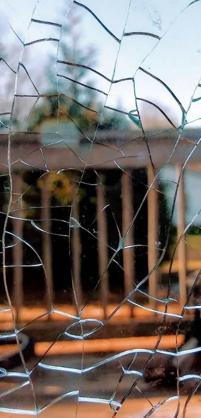 Cracked glass effect with outdoor view wallpaper.