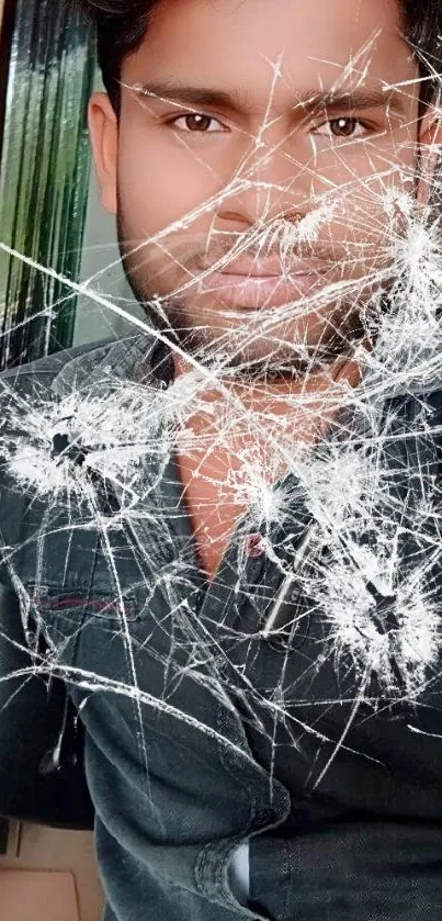 Cracked glass effect mobile wallpaper with edgy design.