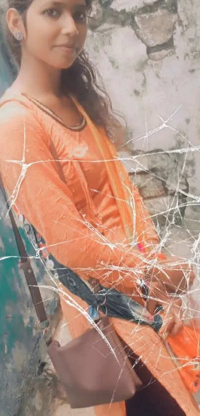 Portrait with cracked glass effect and orange tones.