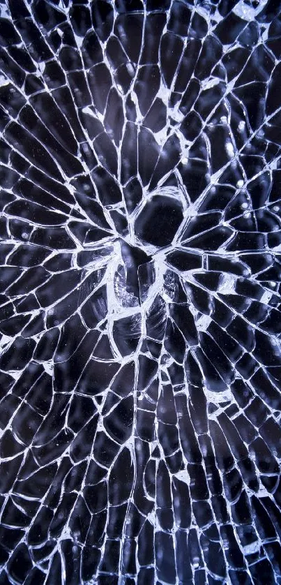 Intricate cracked glass pattern wallpaper in dark blue tones for mobile devices.