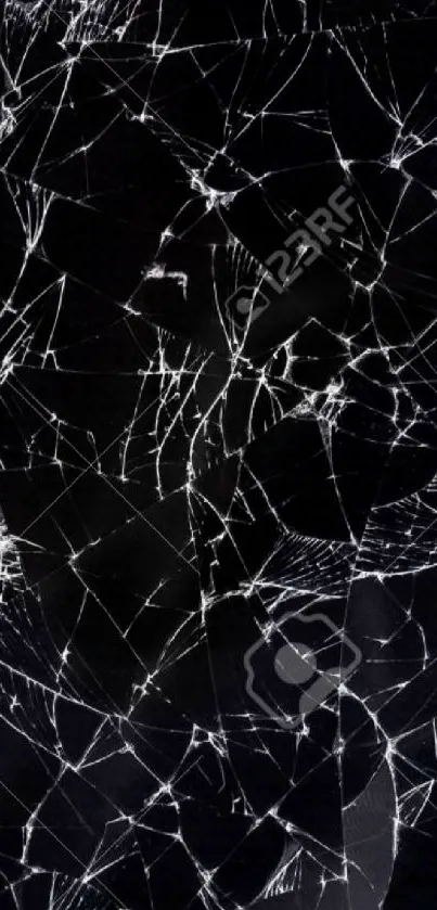 Cracked phone screen with shattered glass effect on black background.